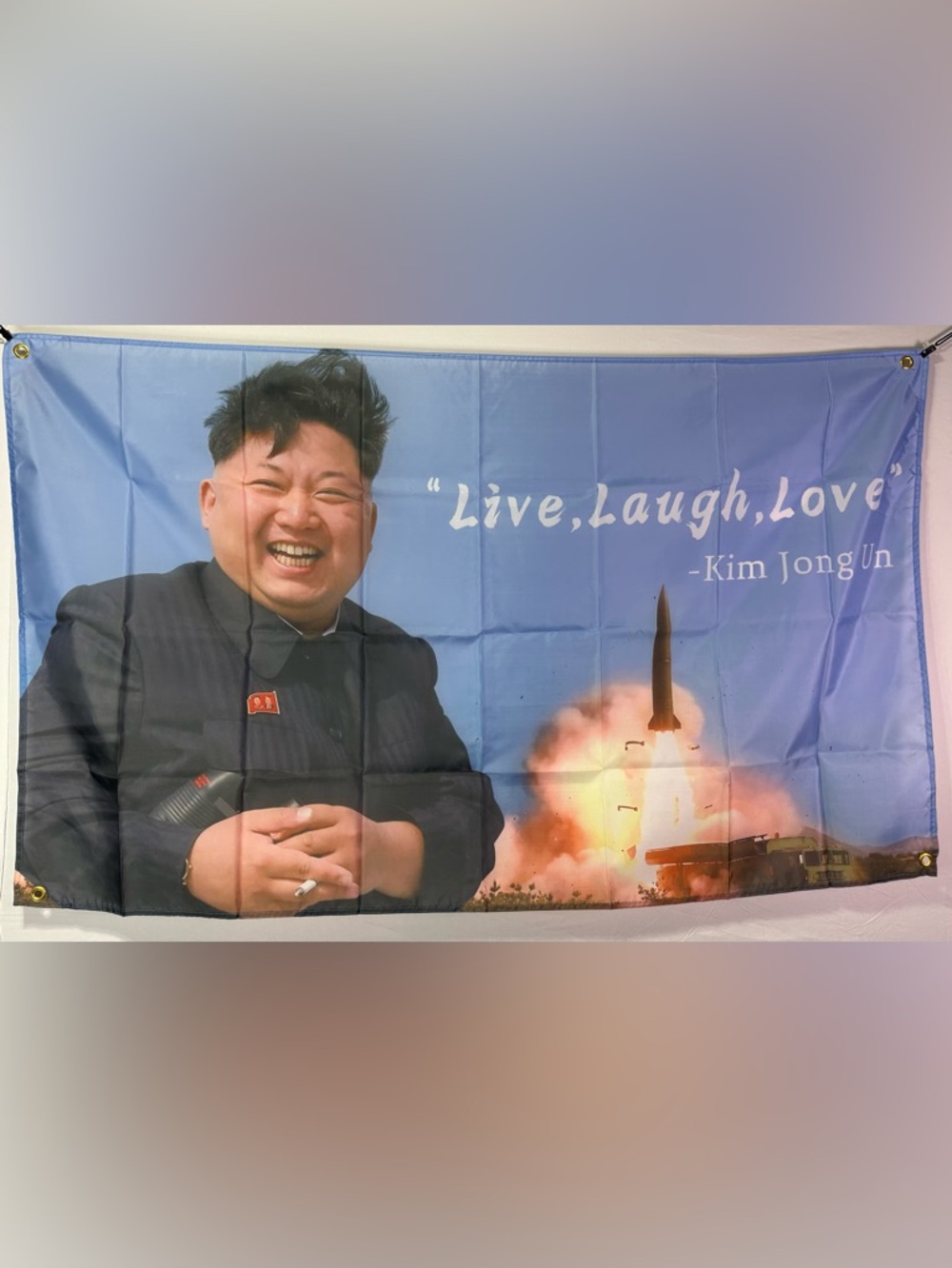 Kim Jong Un “Live Laugh Love” Banner Tapestry 5x3Ft With 4 Grommets